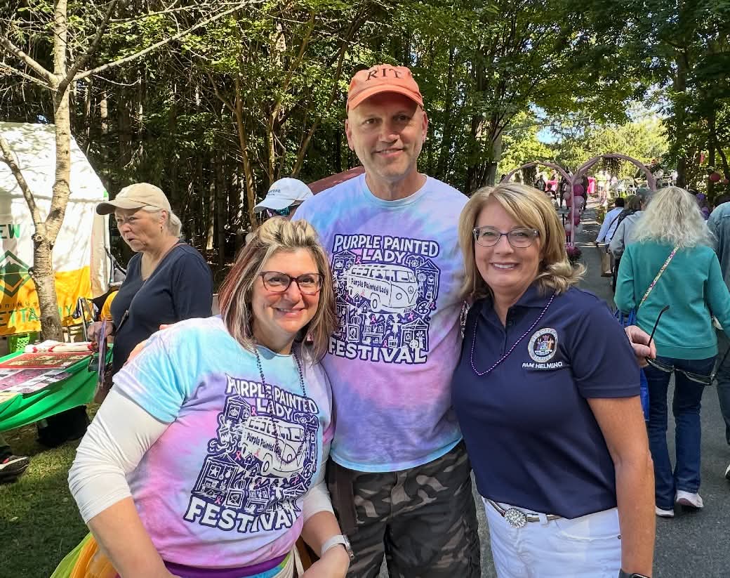 Tricia Kuntz and her husband with Pamela Helming